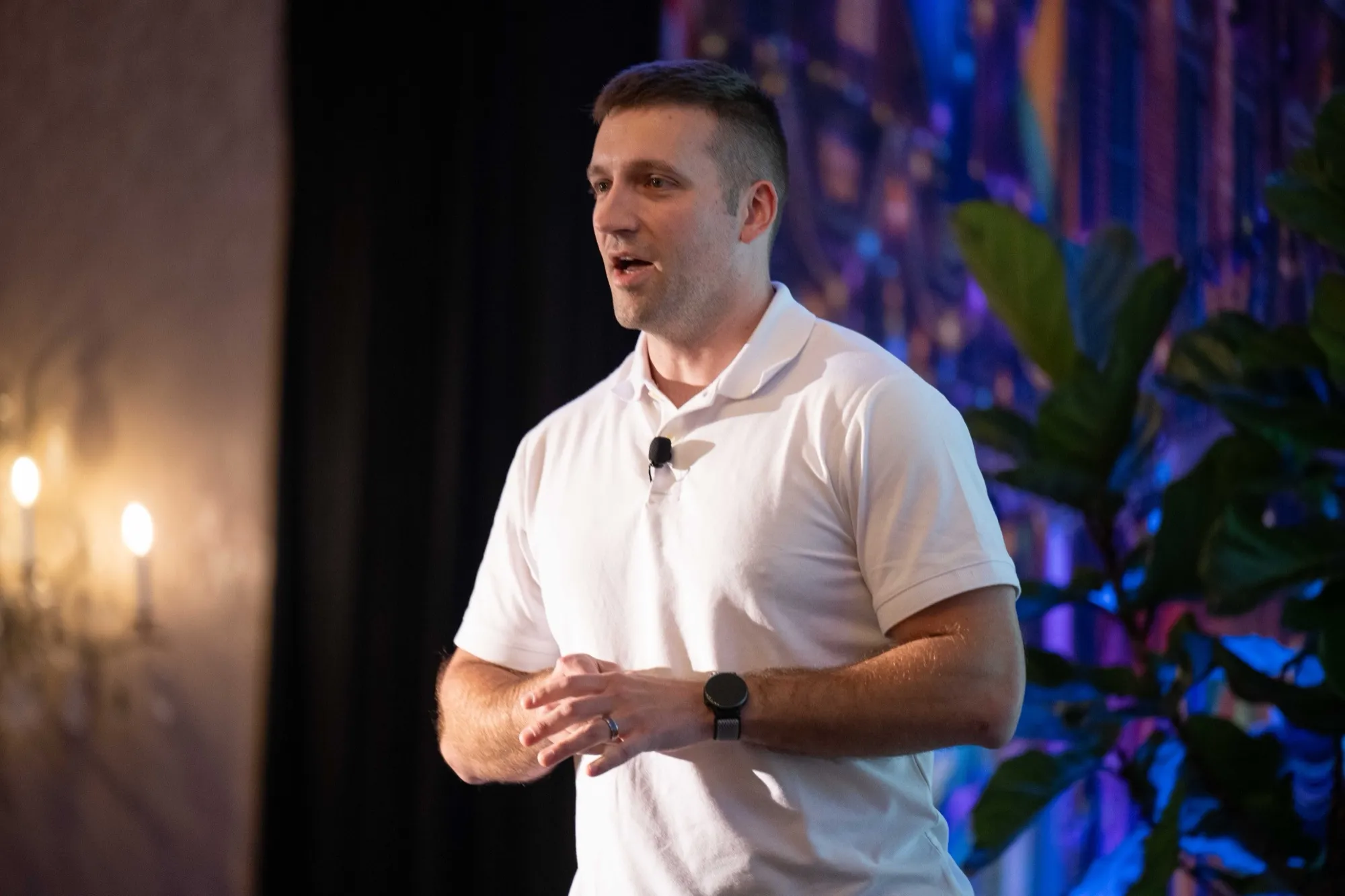 Chris DuBois speaking on stage at FSI's Evolve conference
