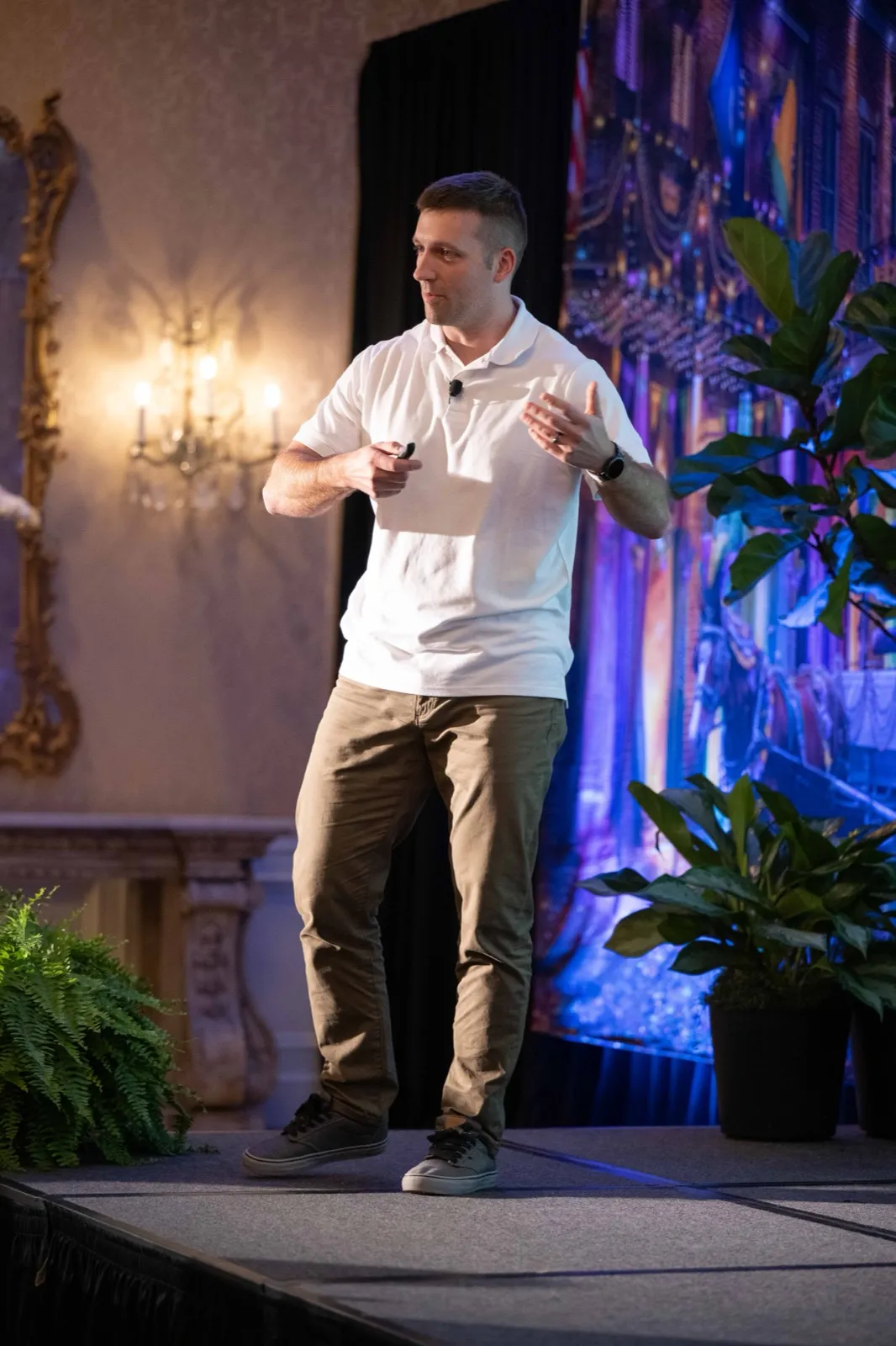 Chris DuBois mid-talk on stage at FSI's Evolve conference